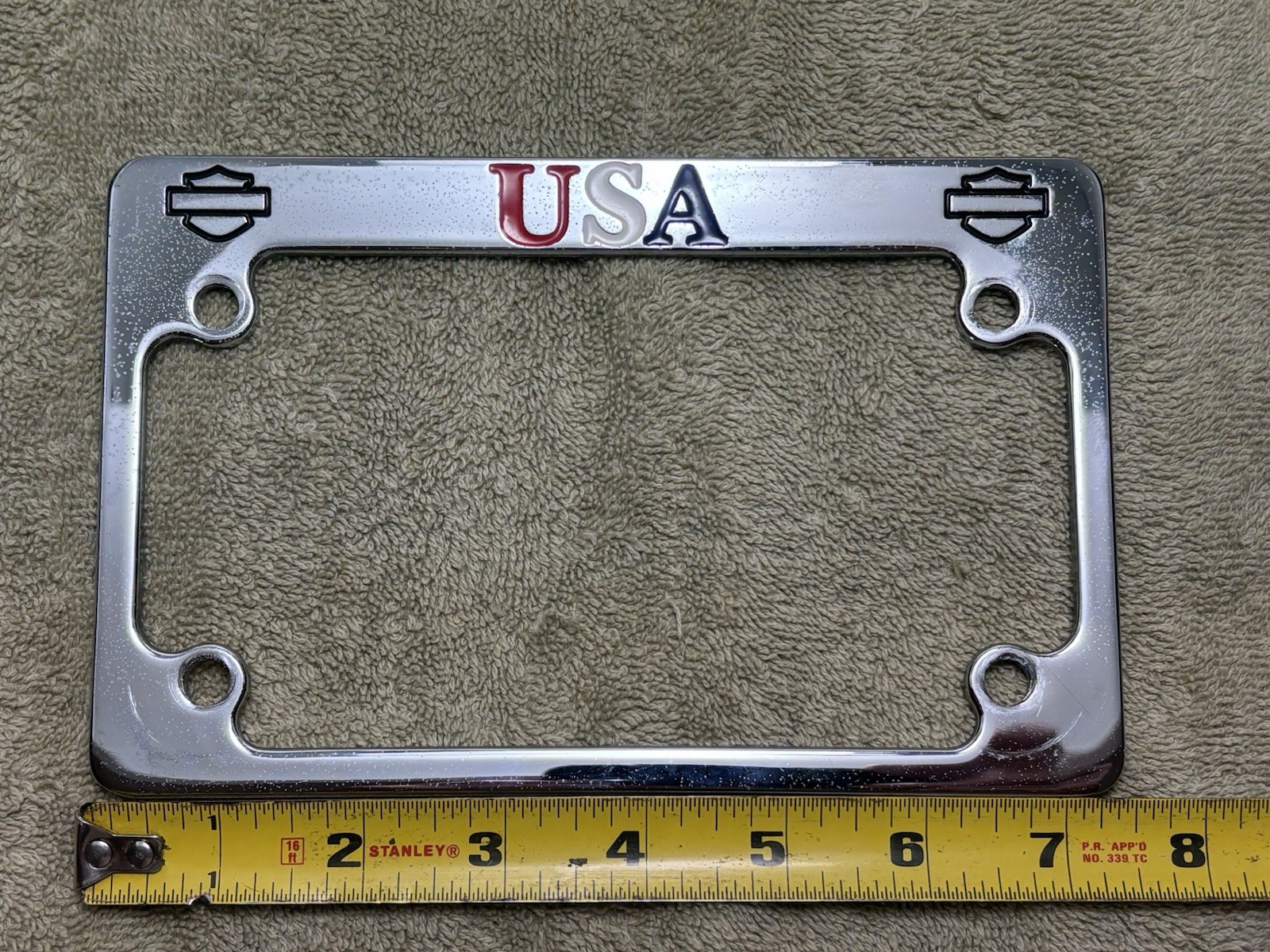 HARLEY MOTORCYCLE USA LICENSE PLATE HOLDER USED AND CLEAN CAST METAL/CHROME