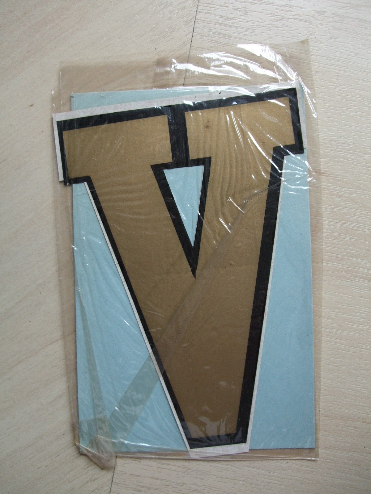 Vintage Plastifilm Self Adhesive Scooter Symbols Gold/Black “V” Lambretta Vespa