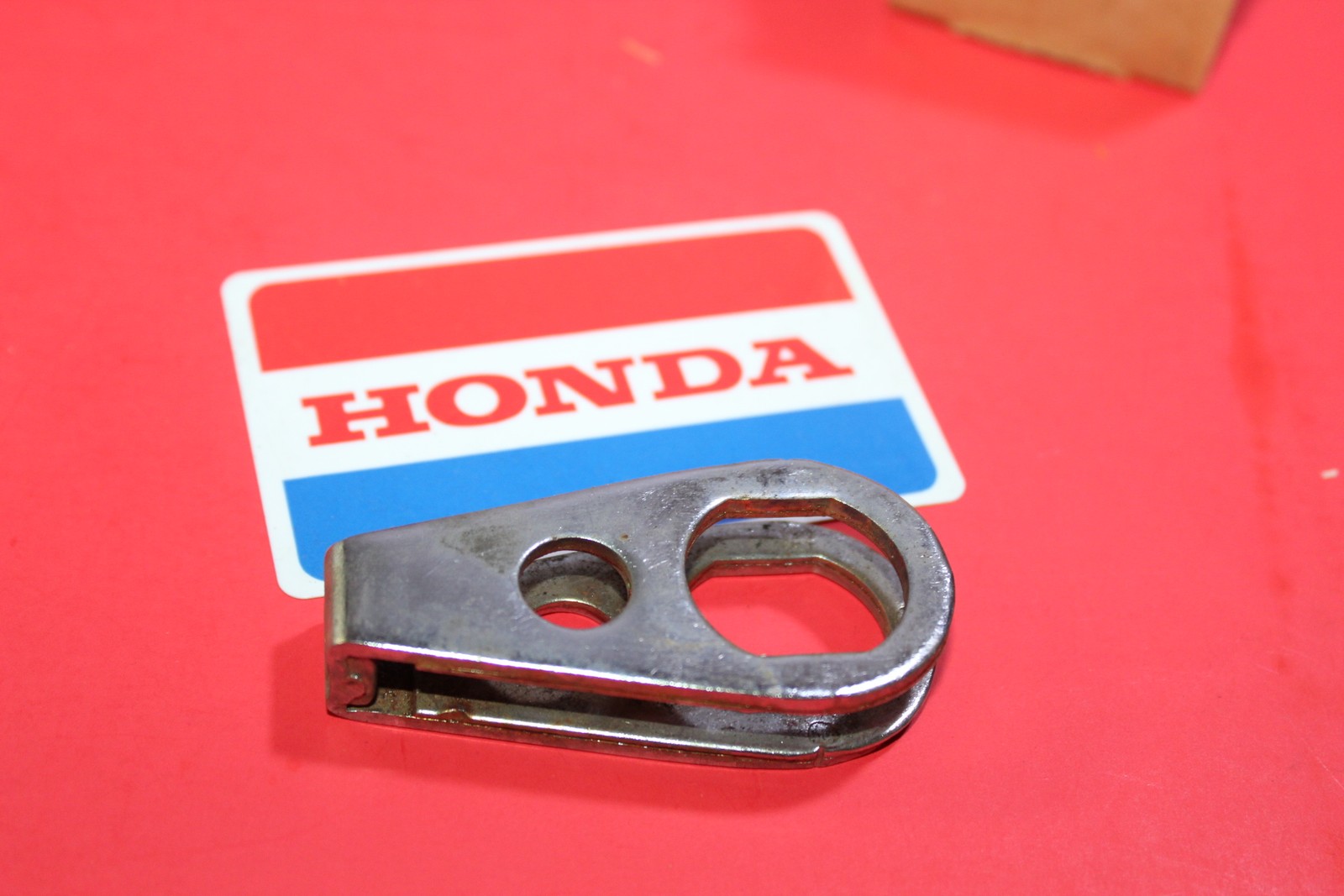 NOS ORIGINAL GENUINE HONDA ADJUSTER, R. DRIVE CHAIN OEM # 40543-273-010