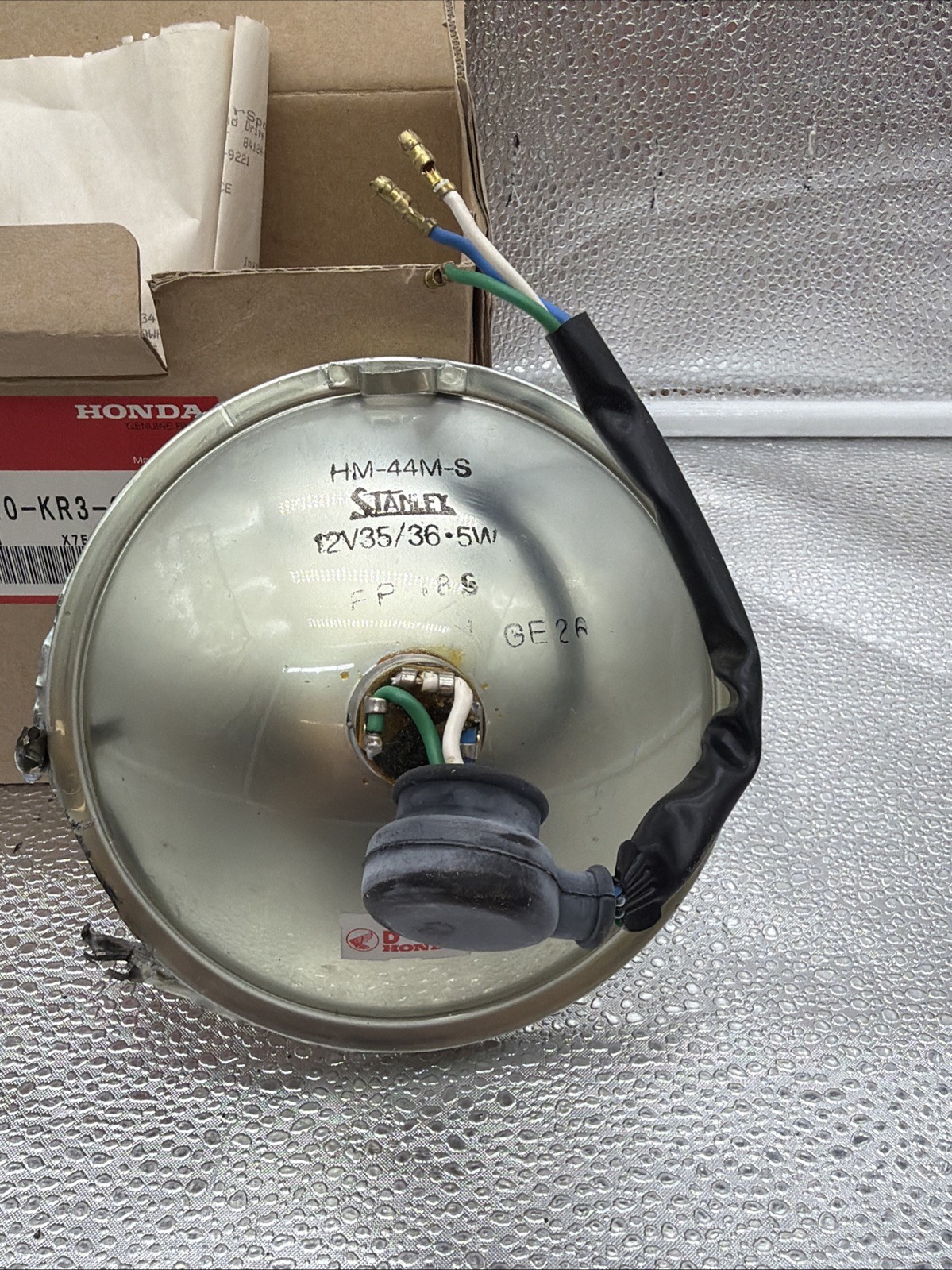 Honda Genuine OEM Headlight Unit, specifically part number 33120-KR3-671