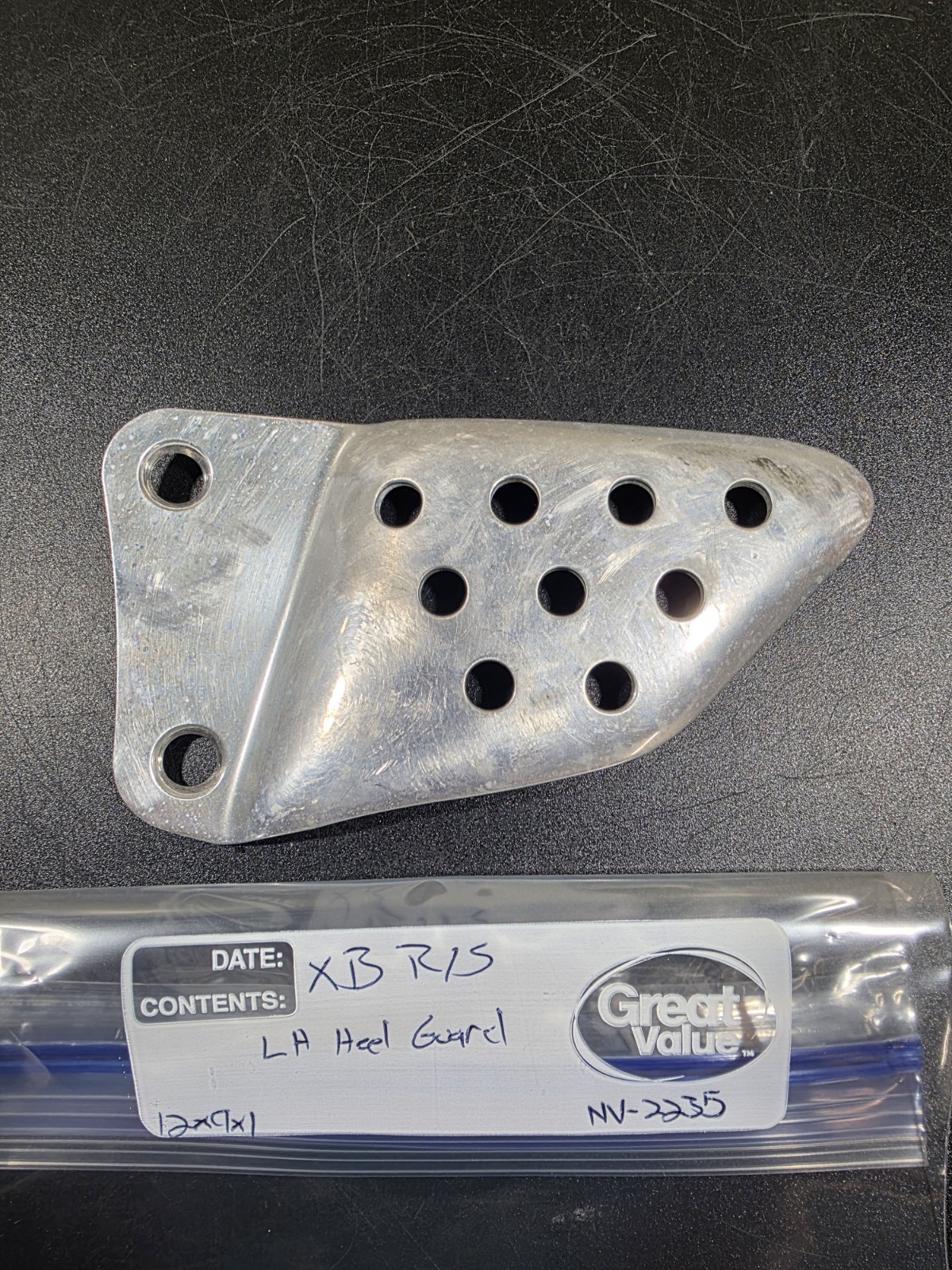 03-07 Buell Lightning Firebolt Left Front Heel Guard XB9 XB12 #NV-2235