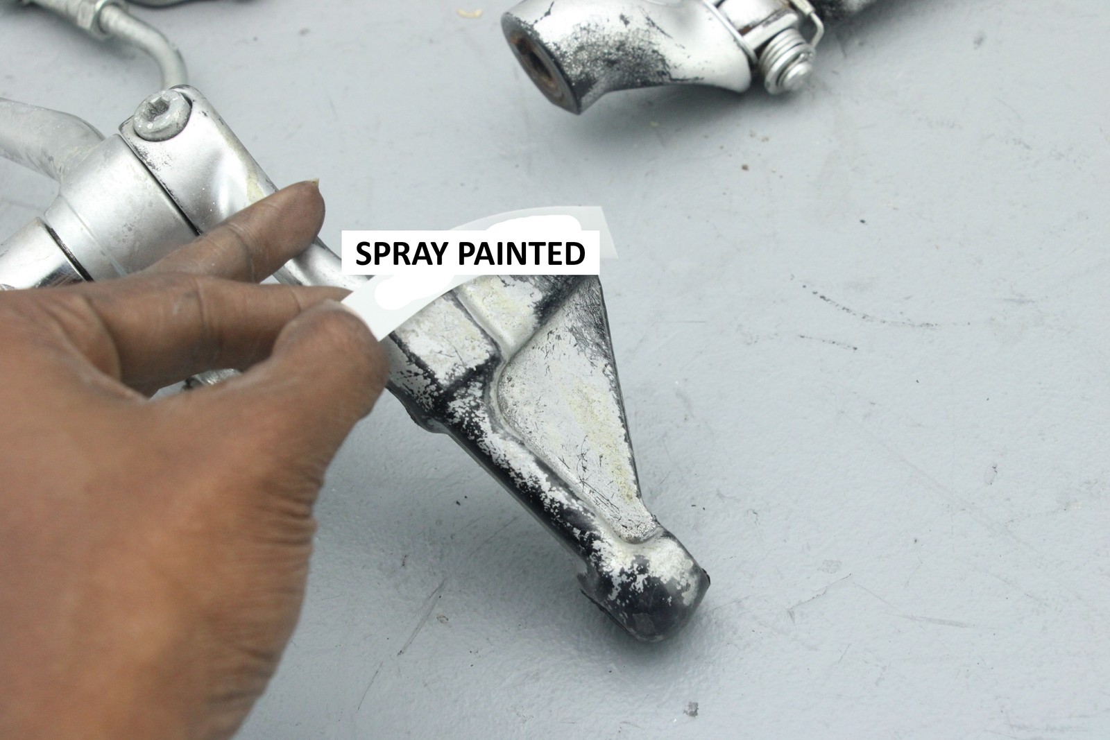 2006 Harley Vrod Front Driver Foot Peg + Mount Bracket Set SPRAY PAINT #4128