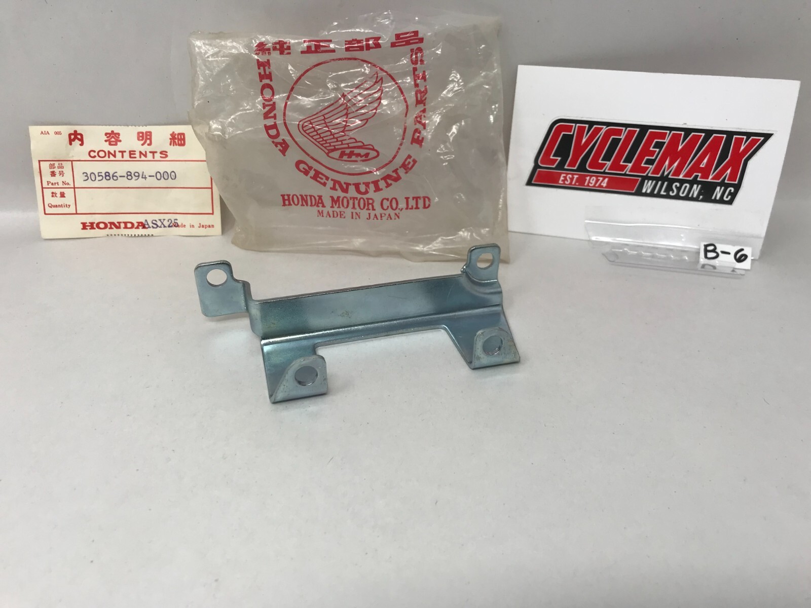 Honda “NOS” Bracket OEM: 30586-894-000