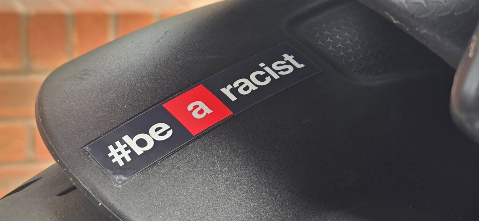 #Be A Racis Sticker Parody x2 Sticker Black designed for Aprilia 660’s & V4’s