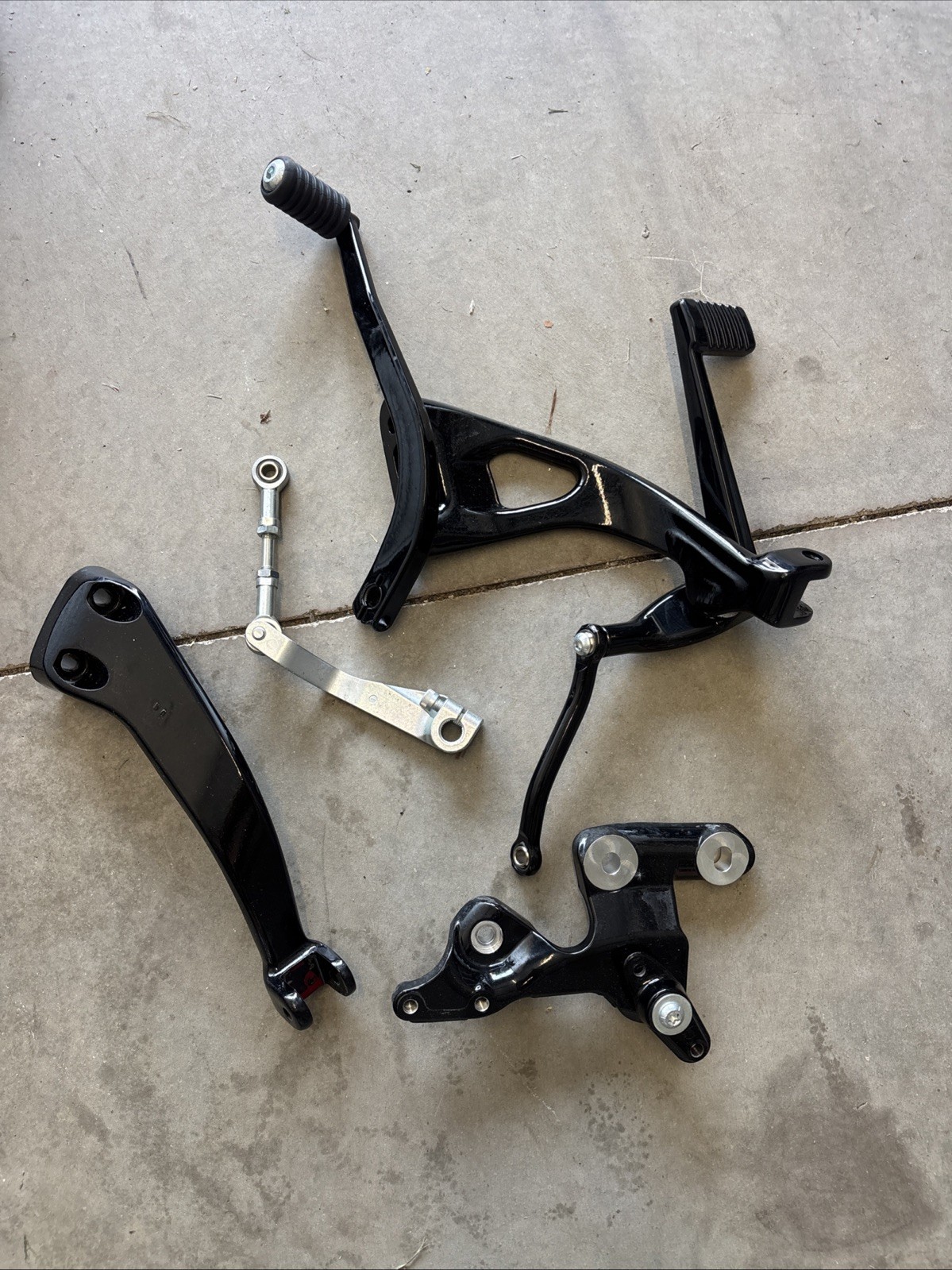 Genuine OEM Harley 18+ Softail Street Bob mid control shifter brake peg mounts
