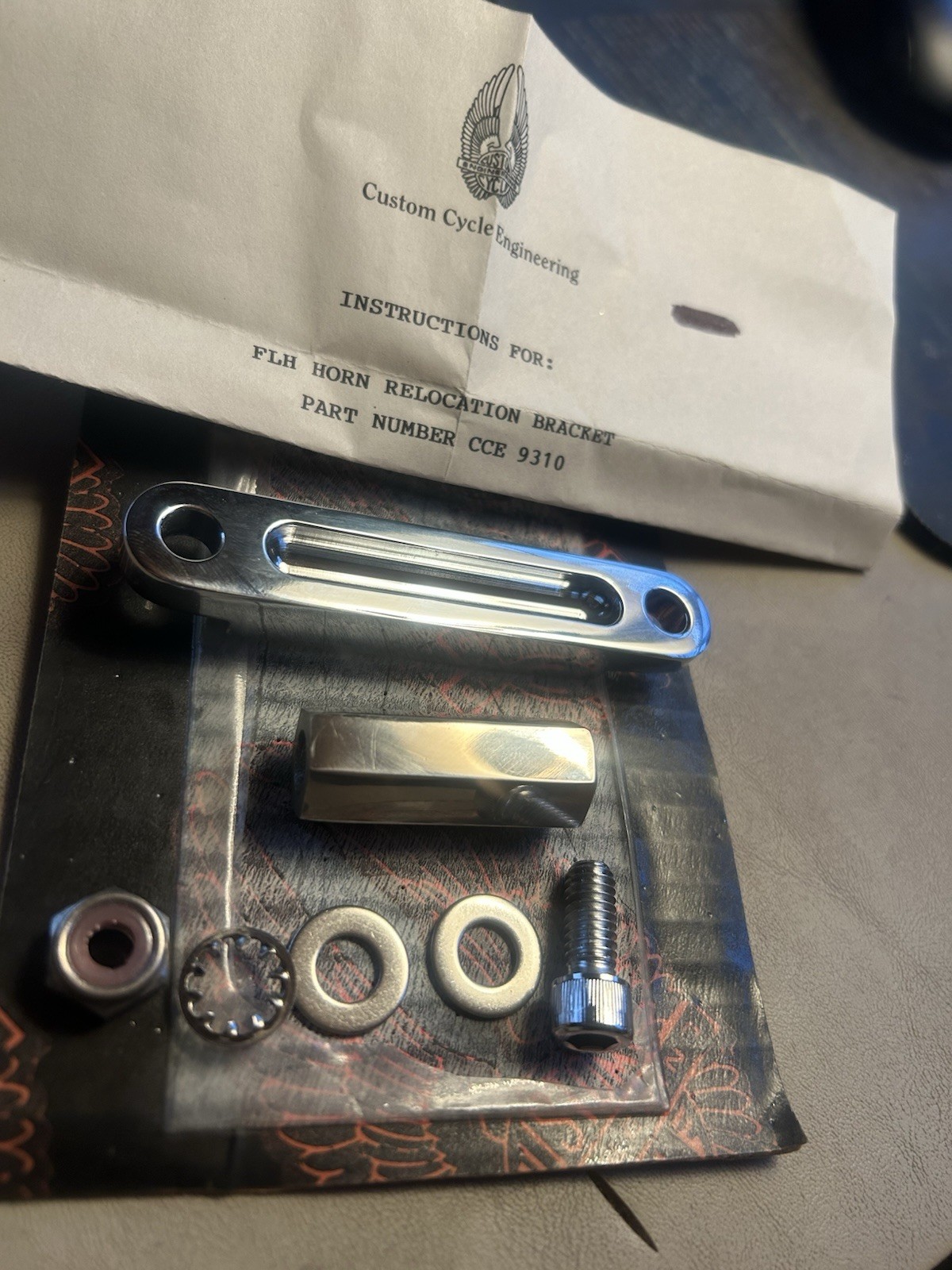 Harley Davidson Chrome FLH Horn Relocation Bracket by Custom Cycle Engineering