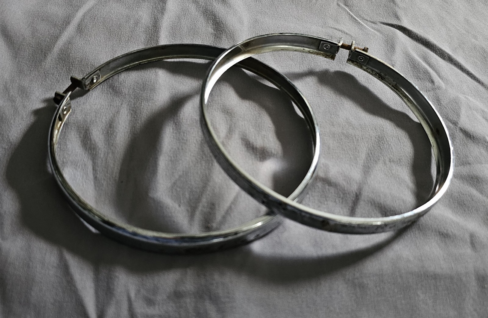 67727-72P Harley Davidson Genuine Aermacchi Used OEM Headlight Ring (2) w/screws