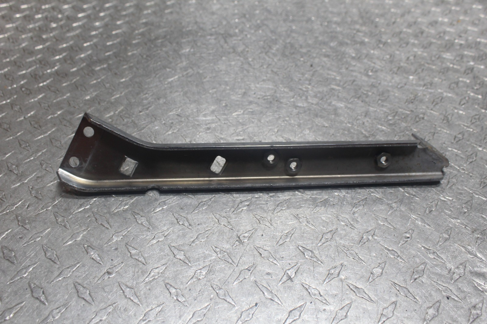 2007 Harley Electra Glide Right Saddlebag Support Mount Bracket CHROME 90720-79C