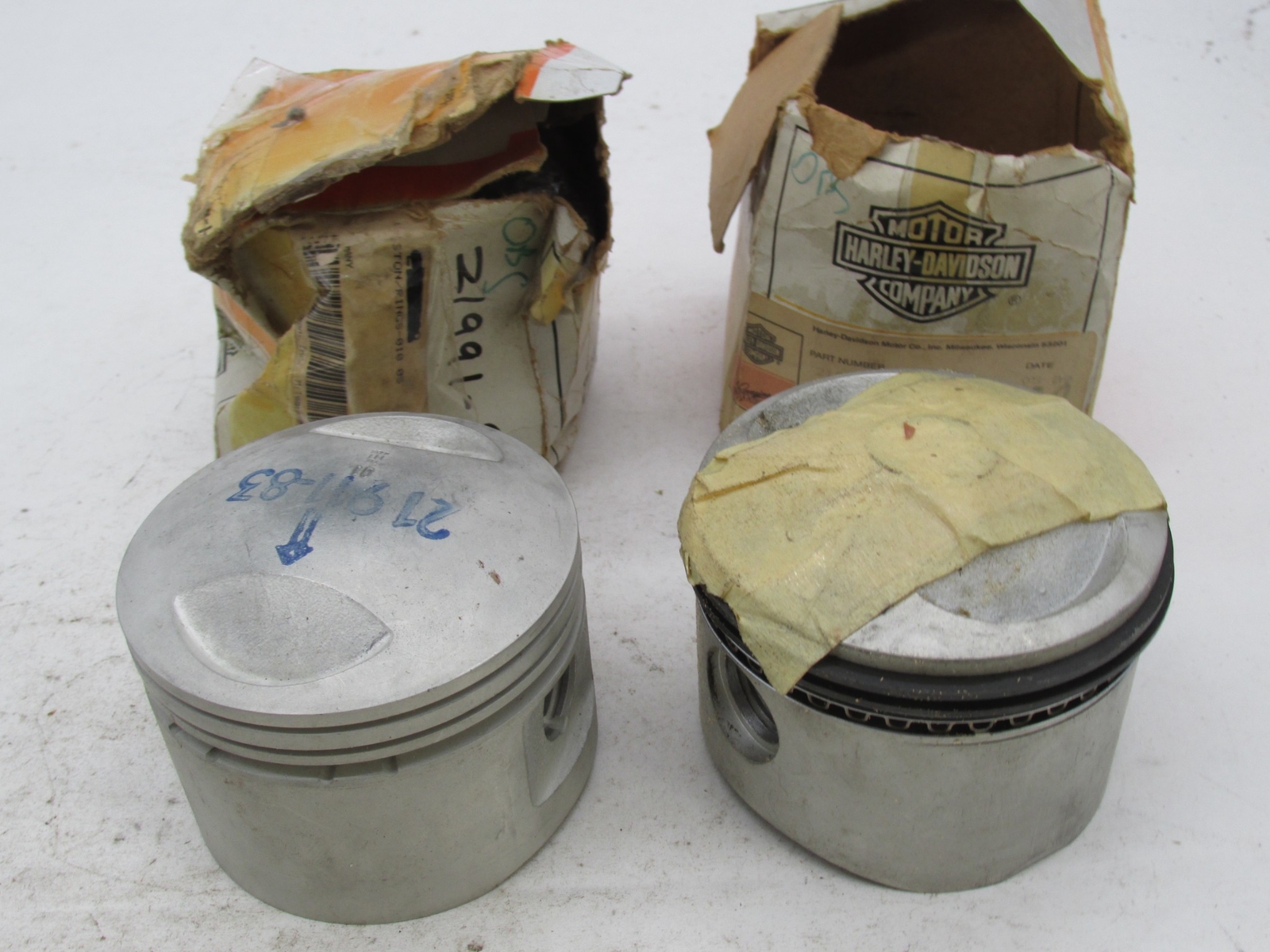 Set of 2 Harley Davidson Genuine NOS Pistons +.010″ ’81-’84 offset pin 21991-80A