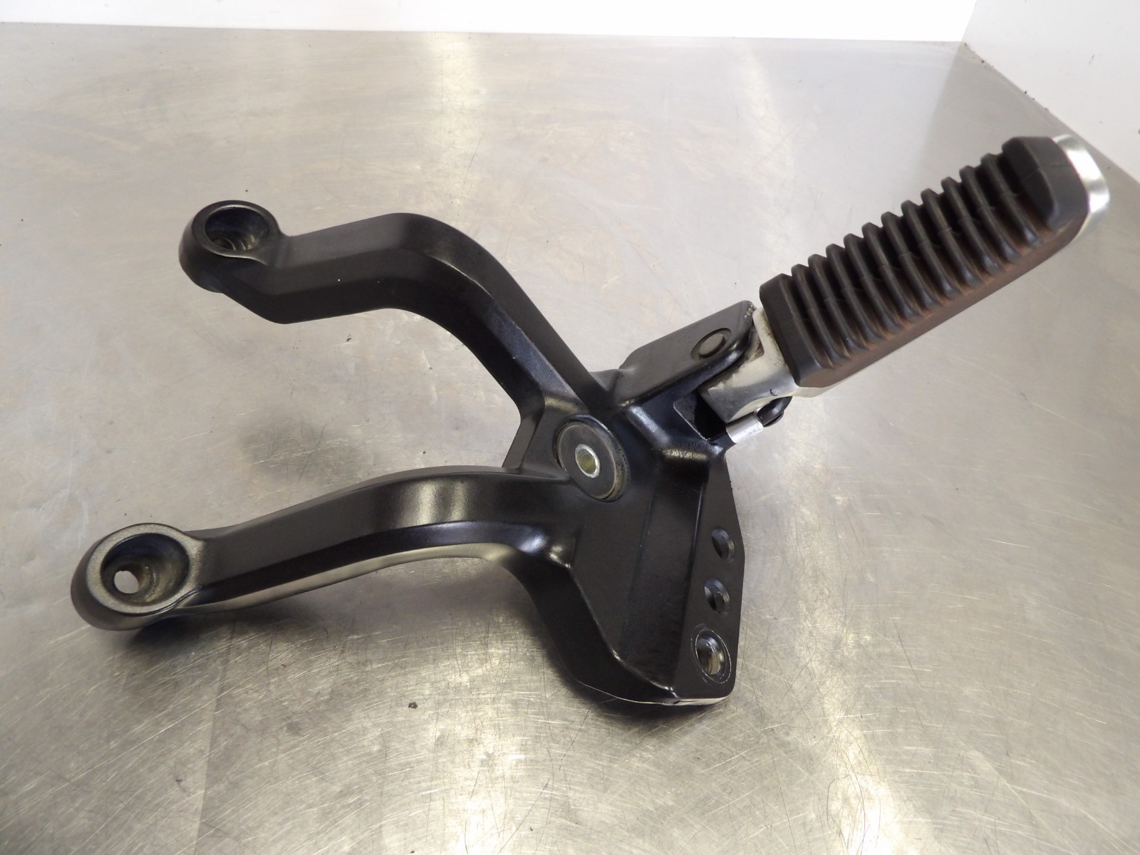 09 Suzuki V-Strom DL1000 rear right passenger footrest bracket 43811-06G01-YAP