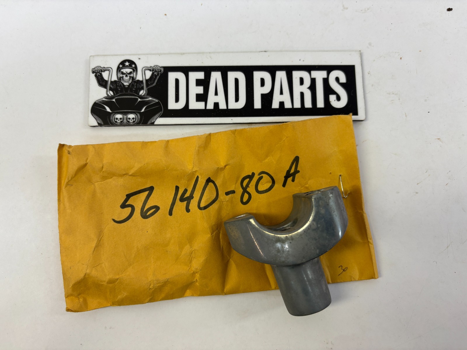 Harley NOS OEM right handlebar riser mount 56140-80A