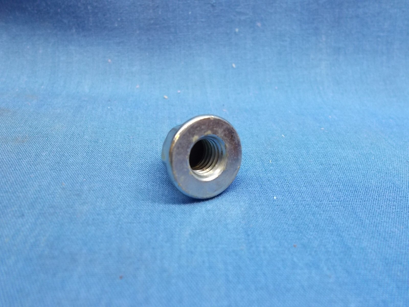 Honda 90443-107-000. OEM Cap Nut. 8mm-1.25. Fits Multiple Honda Applications.
